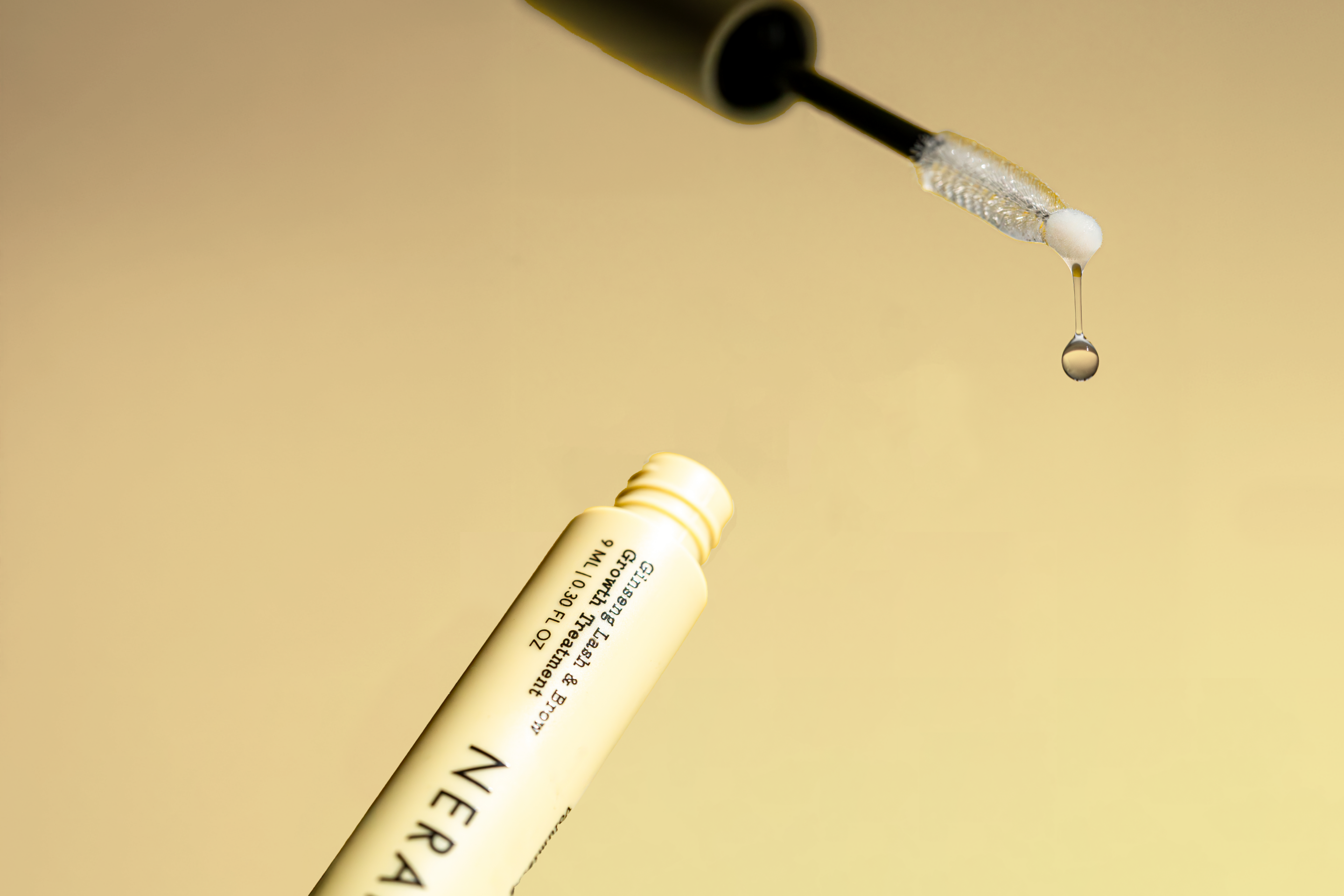Lightweight, water-based Ginseng Lash & Brow Serum droplet—designed for easy absorption and enhanced lash and brow growth without heaviness.